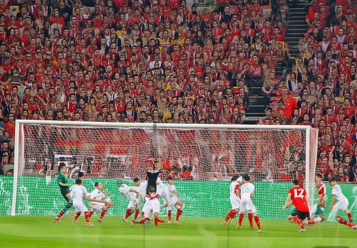 2014恒大上港巅峰对决：南北足球文化碰撞与战术对决解析(图2)